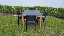 BRAND NEW Hard Wood Dining Table with Polypropylene All weather Top and (4) Black Stacking Aluminum