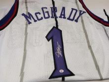 Tracy McGrady of the Toronto Raptors signed autographed basketball jersey PAAS COA 771