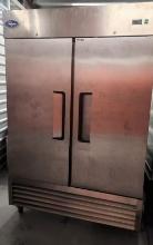 Two Door Stainless Steel Reach-In Refrigerator with Stainless Steel interior and (4) Epoxy Coated Ad