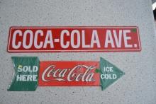 2 metal Coca-Cola signs