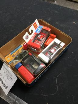 box of seven vintage, diecast cars in boxes