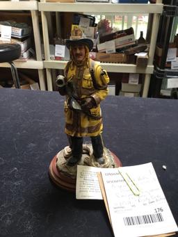 Red hats beyond the call of courage, fireman figure on base with COA