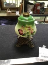 vintage handpainted oil lamp with cast iron base