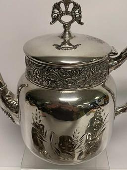 FOUR PIECE SILVER PLATE HAND CHASED TEA SET