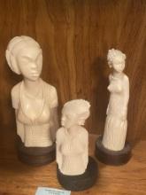 THREE FEMALE FORMS CARVED FROM ANTLER