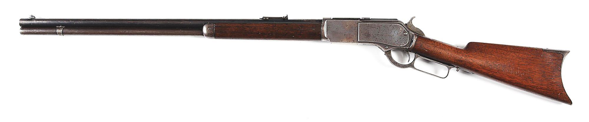 (A) WINCHESTER MODEL 1876 LEVER ACTION RIFLE.