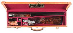 (M) EXQUISITE STEVE KELLY ENGRAVED JAMES PURDEY & SONS 12 GAUGE OVER/UNDER SHOTGUN WITH CASE.