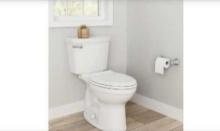 American Standard Champion Two-Piece Elongated Chair Height Toilet with Slow-Close Seat in White