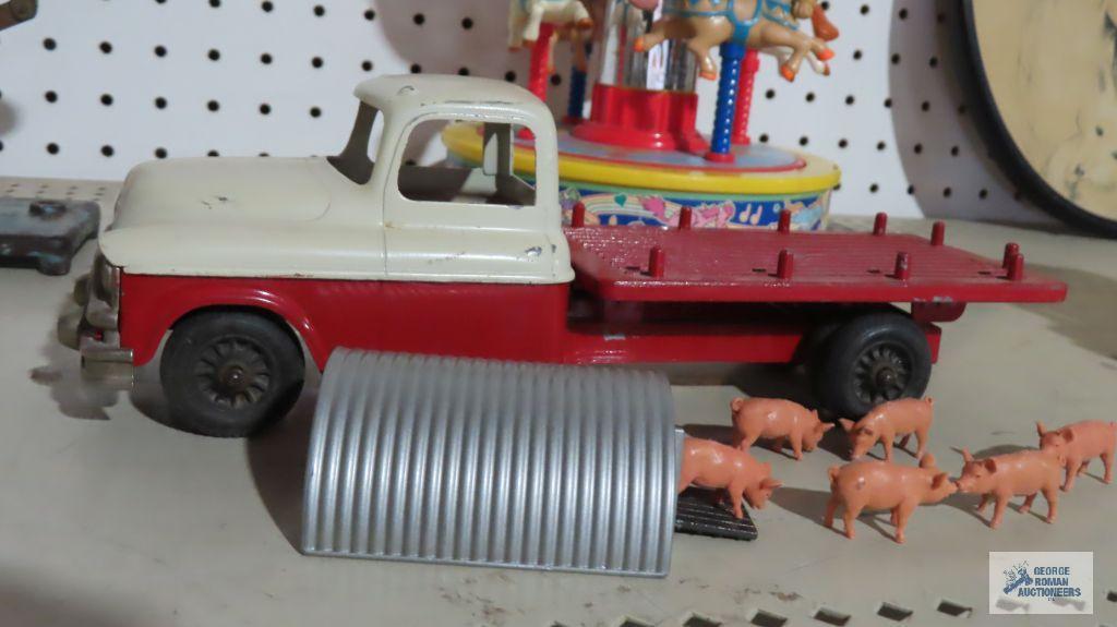 Vintage Hubley Kiddie Toy truck number 494...and miniature pig figurines
