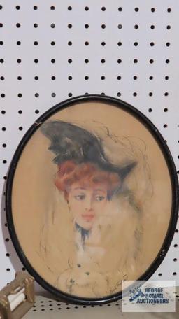 Antique framed artwork of woman with dog. From Jewhurst...Art Store, Youngstown, Ohio