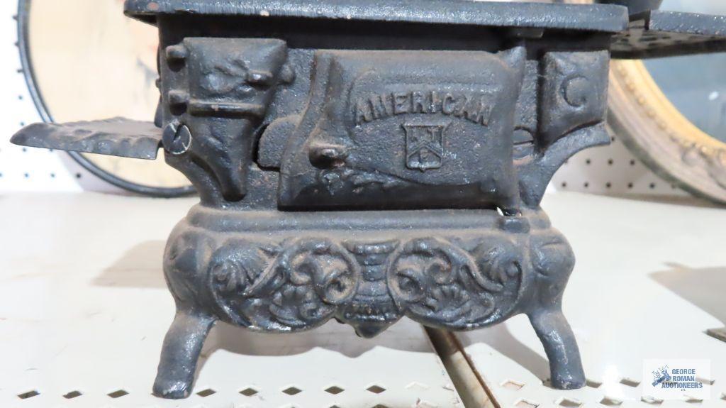 American brand cast iron salesman sample cook stove with accessories
