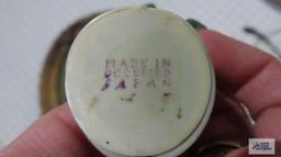 Antique celluloid tape measure made in Occupied Japan. Has crack.