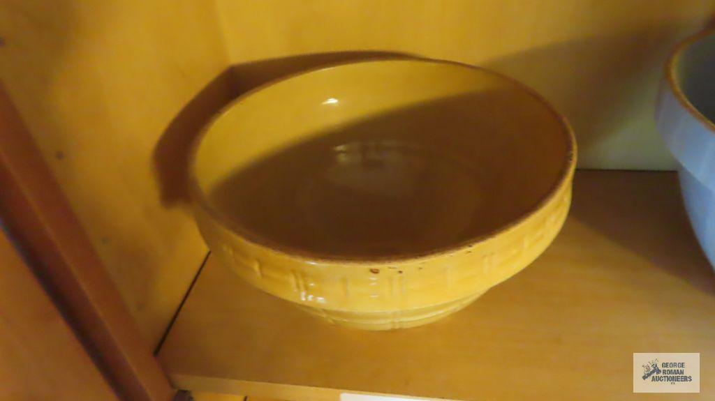 Pottery mixing bowl, marked nine on bottom