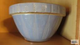 Pottery bowl with stars and moon on side and number 11 on the bottom. Chips on bottom.
