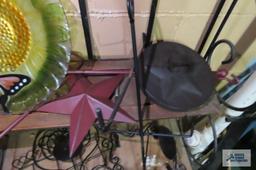 Metal shelf with assorted decorative items