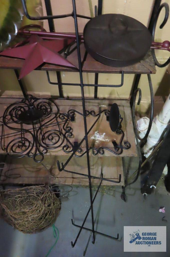 Metal shelf with assorted decorative items
