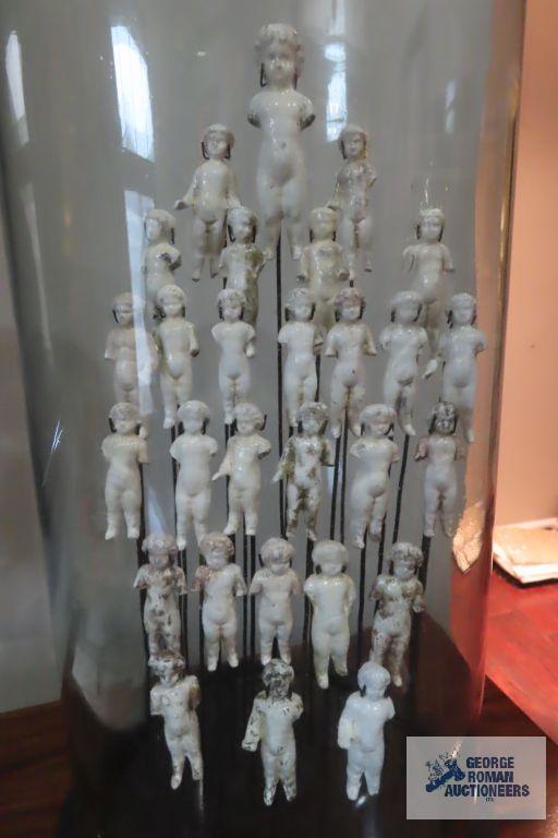 19th century Frozen Charlotte dolls sculpture with glass display