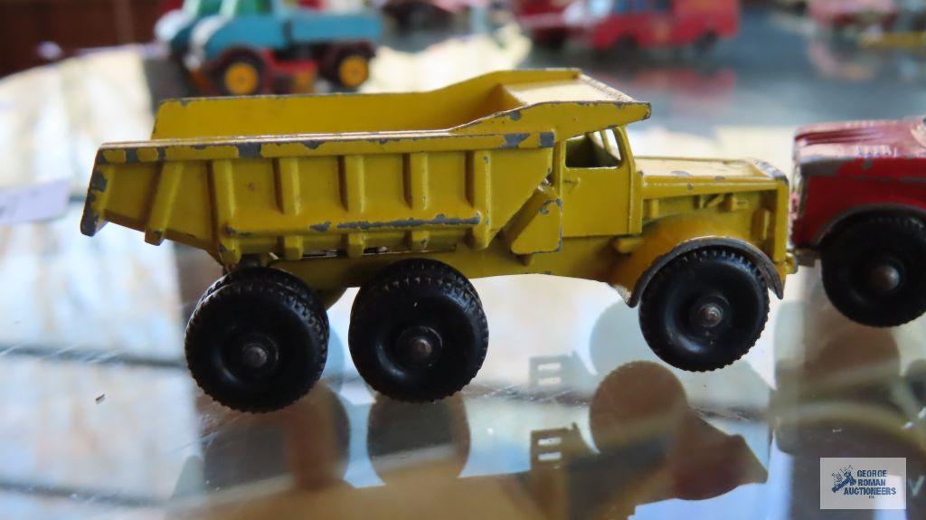 Two dump trucks made in England by Lesney
