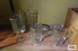 Assorted Christmas glasses with gold rims