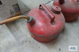 Two Stihl vintage fuel cans