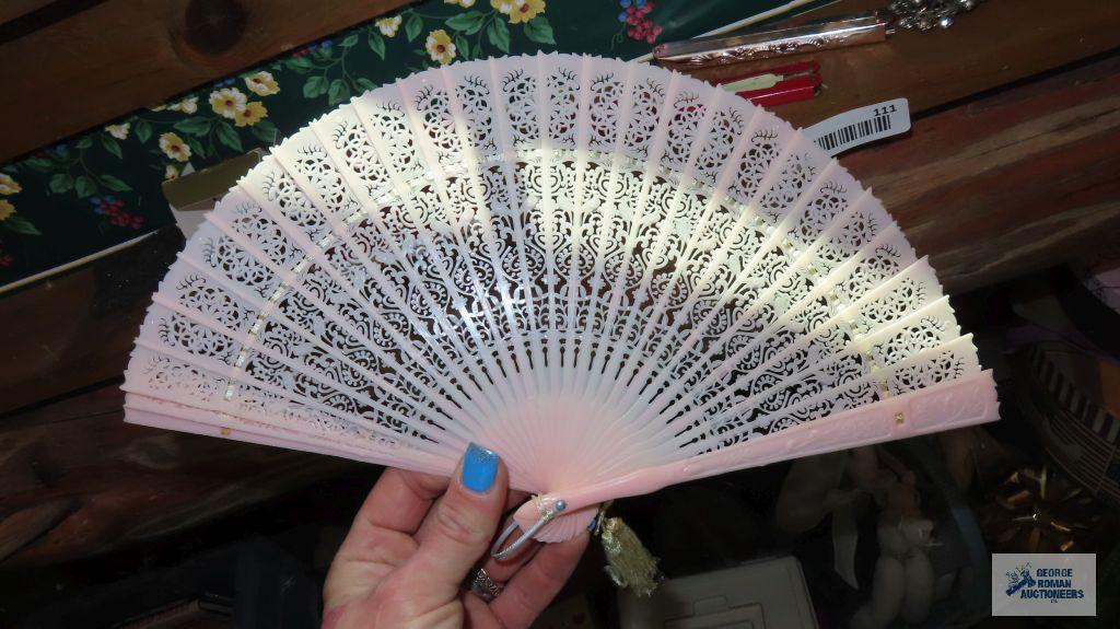 Assorted fans and jewelry