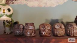 Shelf of owl figurines