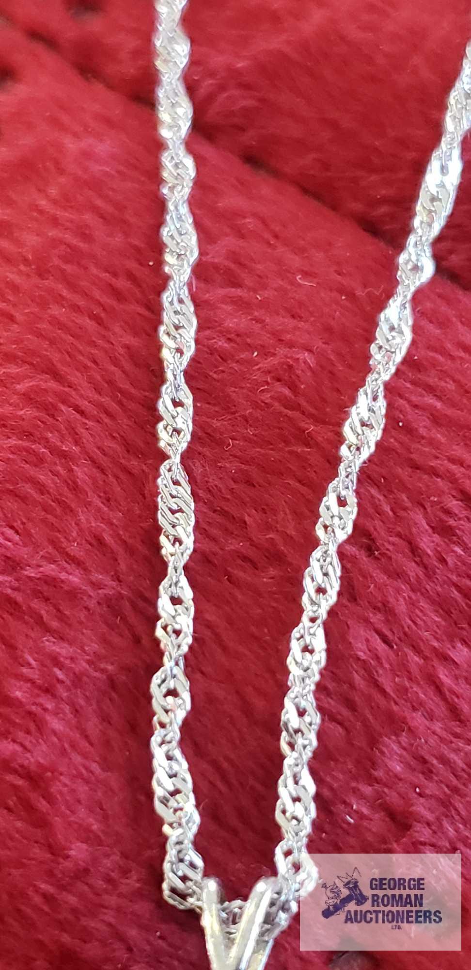 Silver colored chain, marked 14K Milor Italy, approximate total weight is 1.48 G with silver colored