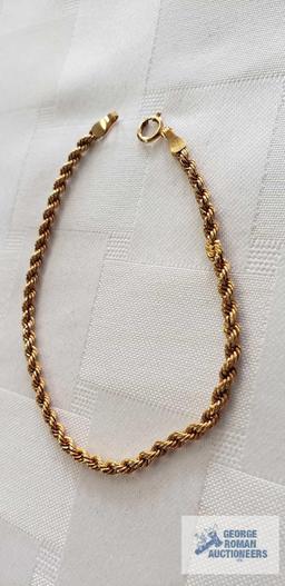 Gold colored rope bracelet, marked 14KT Italy, total weight approximately 1.22 G