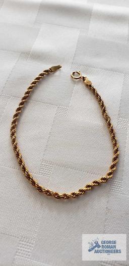 Gold colored rope bracelet, marked 14KT Italy, total weight approximately 1.22 G
