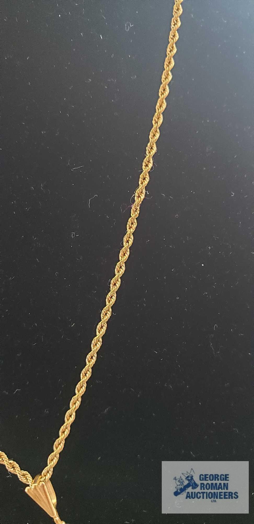 Gold colored snowflake pendant, marked 14K on gold colored rope necklace, marked 14KT Italy,