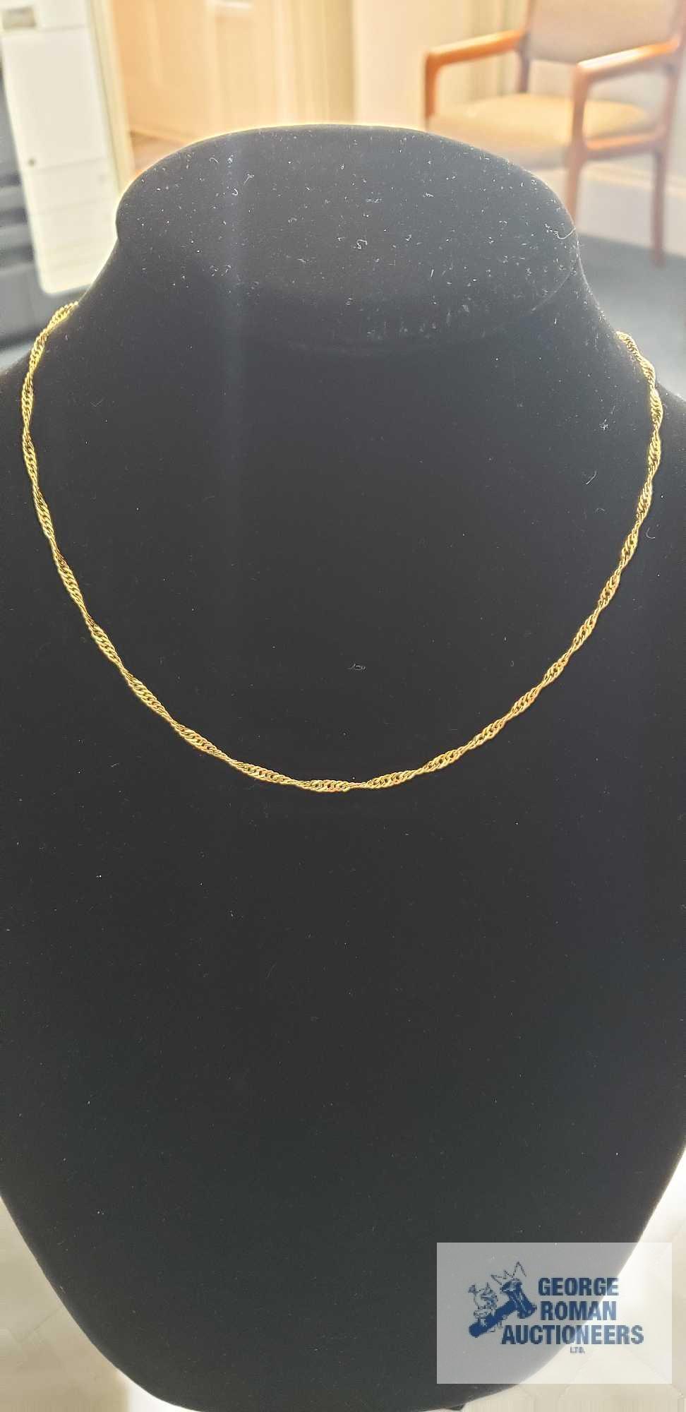 Gold colored twist chain, marked 14KT Italy, approximate total weight is 4.74 G