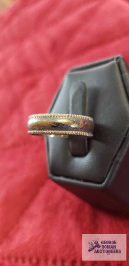 Silver colored band ring, marked Sterling, approximate total weight 3.16 G