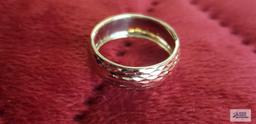 Gold colored band, marked 10K Italy, approximate total weight 1.0 G