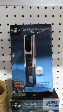 Golf ball monogram stamper, touch screen golf scorecard, golf picture frame, and coin...organizer