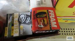 Assorted oil filters, rubber hanger springs for faucets, nails, etc