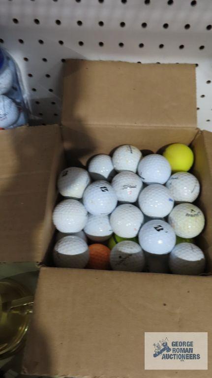 Golf balls, trophies, and other golfing items