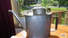 Tin container with handle, lid and spout