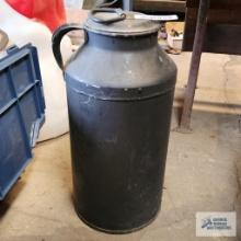 Antique milk can with lid