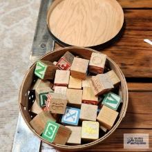 Vintage blocks in wooden container