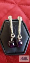 Silver colored dangle earrings with purple bead marked 925 3.2 G (Description provided by seller)