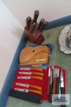 Assorted knives, cutting boards, Rogers knives in knife holder