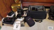 Nikon D 7000 camera with SB-800 autofocus speed light, camera bag, multi-power battery pack, battery
