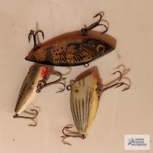 Cordell fishing lure and two swimming minnow fishing lures