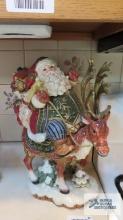 Fitz and Floyd Santa riding reindeer figurine, reindeer head cracked