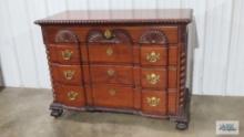 Antique mahogany four drawer dresser base with wheels and ball and claw feet. 35-1/2 in. tall by 48