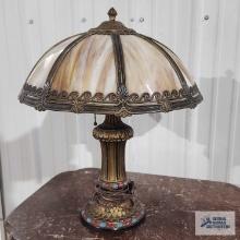 Antique slag glass lamp with metal base. lamp is 21 in....tall, base of glass is 18 in. wide