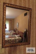 Wood frame mirror, 22 in tall by 16 in wide