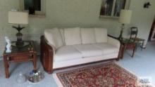 Rattan framed sofa...and pair of rattan end tables with glass tops