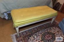 French provincial bench with yellow cushion