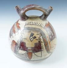 7" tall x 5" wide Beautifully decorated Nazca Dual Spout Bottle. Recovered in S. America.
